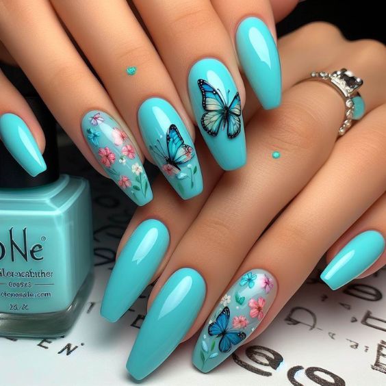 Aqua Blue Nails With Fluttering Butterflies