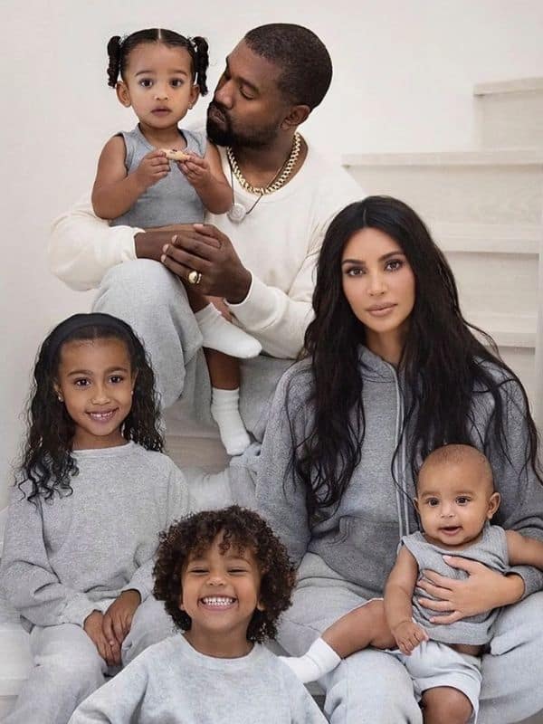 Kim and Kanye with their her children