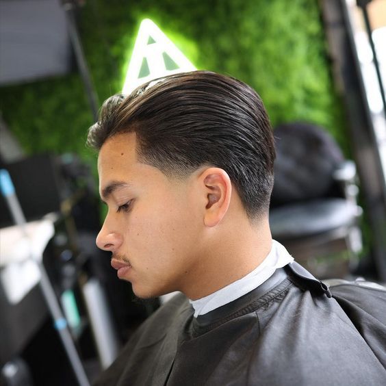 Low Taper with Slicked Back Hair