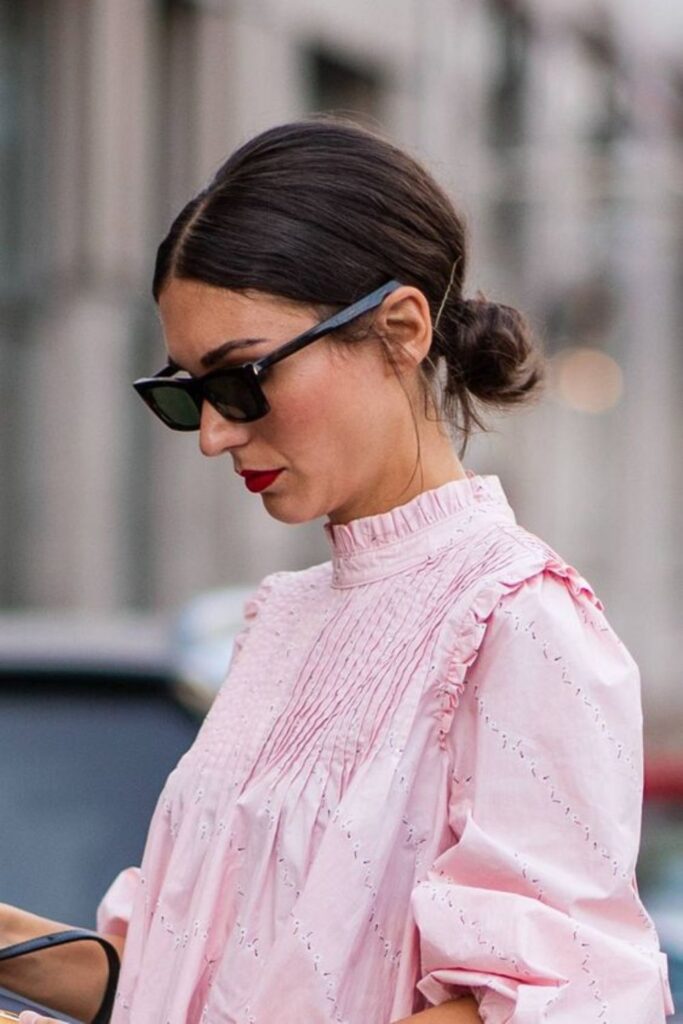 Sleek Low Bun with Middle Part Modern Sophistication