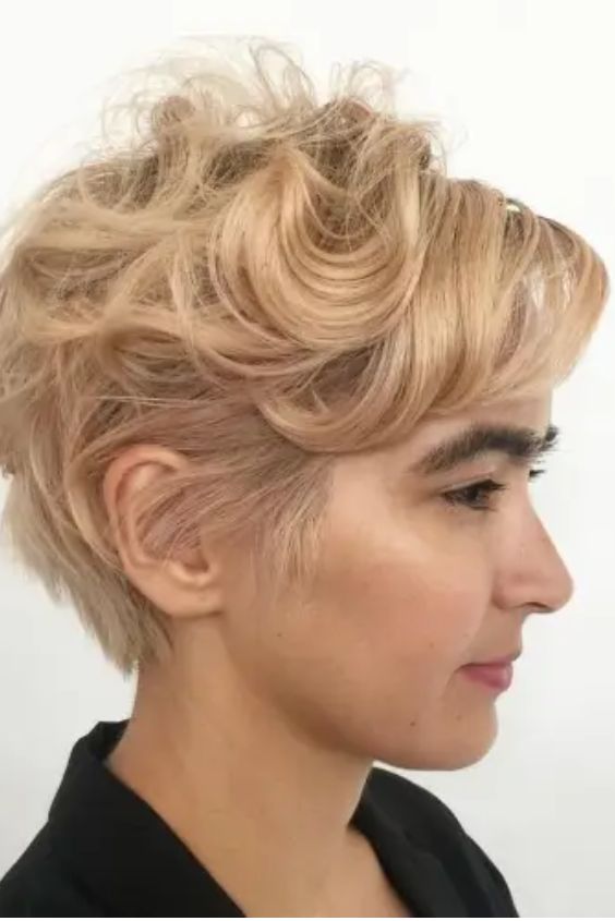 Strawberry Blonde Pixie With Textured Layers