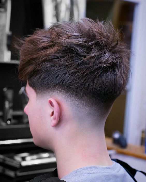 Low Skin Fade with Textured Top
